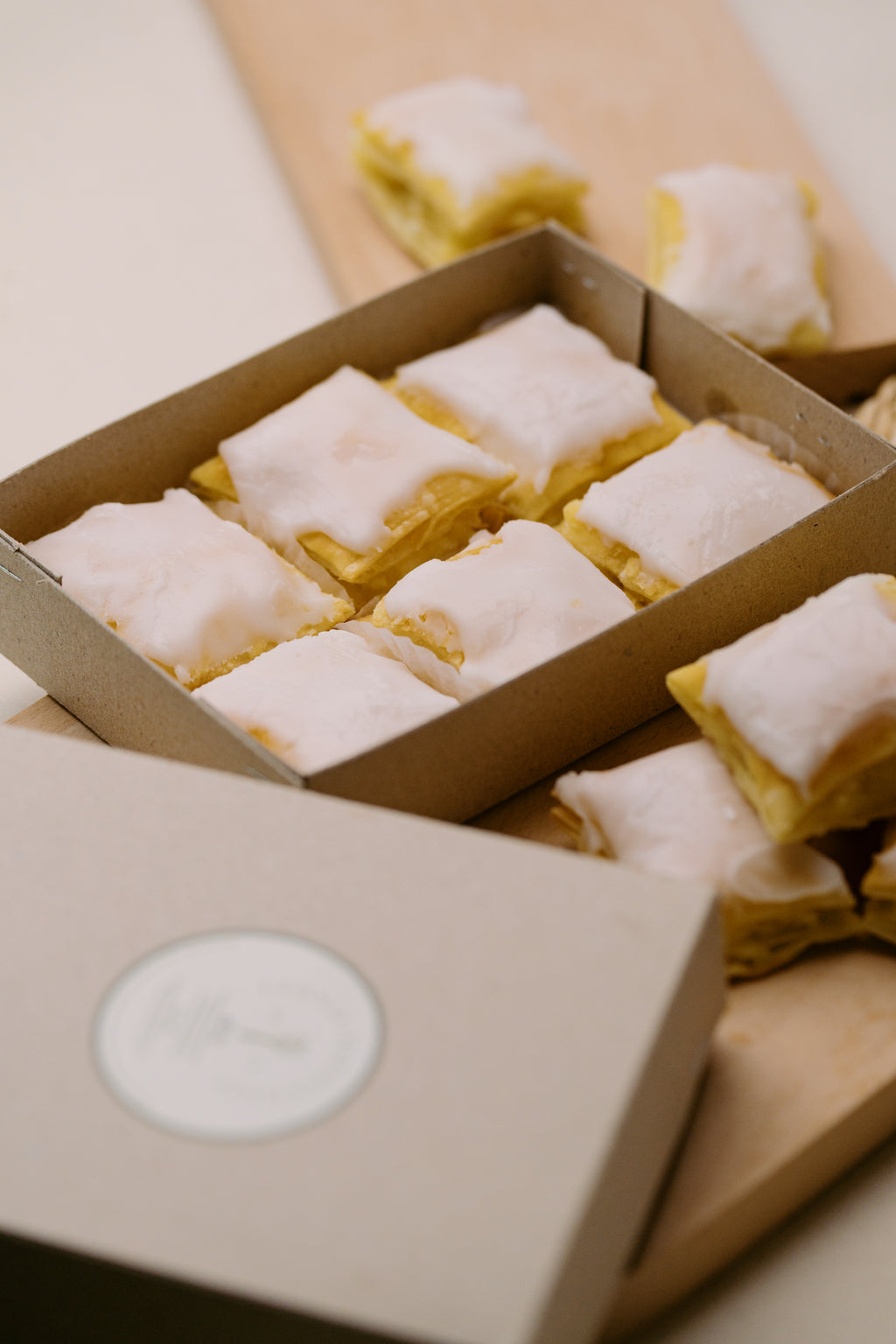 Close-up of flaky glazed Napoleones in the 6-piece Tasting Box