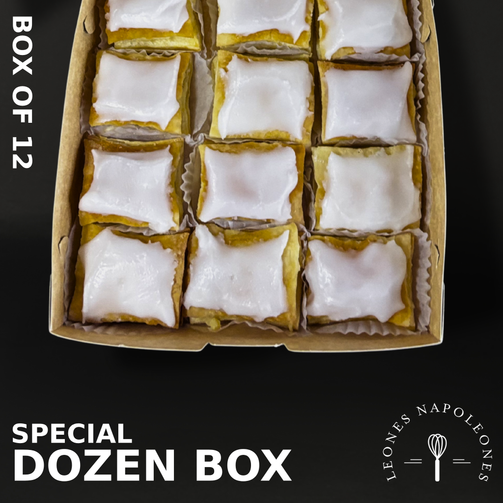 Box of 12 Leones Napoleon pastries with a visible brand logo on a black background